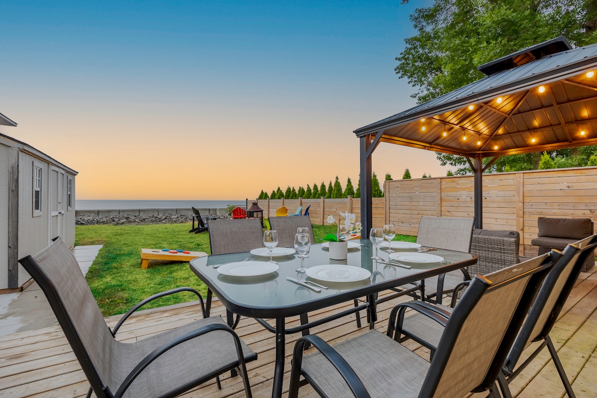 Hamilton home with a Lake Ontario view and backyard fire pit